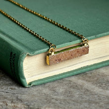 Load image into Gallery viewer, Peach druzy crystal bar necklace with gold stainless steel textured chain