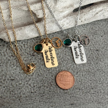Load image into Gallery viewer, Adventure Awaits - Engraved stainless steel necklace - silver or gold with mountain charm and emerald green glass gem