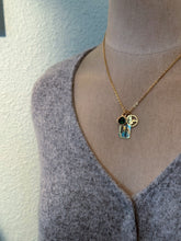 Load image into Gallery viewer, Adventure Awaits - Engraved stainless steel necklace - silver or gold with mountain charm and emerald green glass gem