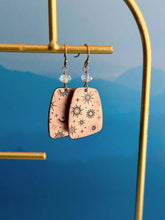 Load image into Gallery viewer, Rustic copper celestial dangle earrings with aurora borealis crystals - moons and stars