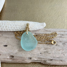 Load image into Gallery viewer, Aqua blue seafoam Sea glass pendant with gold brass mermaid tail bail and stainless steel chain