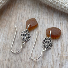 Load image into Gallery viewer, Sterling silver brown sea glass earrings - silver scroll dangles

