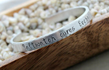 Load image into Gallery viewer, saltwater cures everything - Hand stamped bracelet - 1/4 Inch Bangle Silver tone aluminum - skinny Cuff Bracelet - gift for beach lover wave