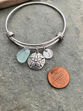 Load image into Gallery viewer, sand dollar charm bracelet, stainless steel adjustable bangle with genuine sea glass, and hand stamped initial disc Beach glass jewelry
