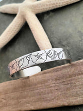 Load image into Gallery viewer, Beach Cuff bracelet - hand stamped silver aluminum - Seashells and Sand dollars - Tropical Beach gift - gift for beach lover gift for friend