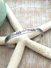Load image into Gallery viewer, Mountain Range and Tree Scene Bracelet - Hand stamped silver aluminum cuff bracelet - 1/4 Inch skinny stacking bangle - Birthday gift