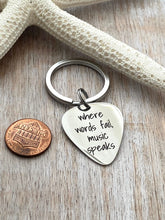 Load image into Gallery viewer, Stainless steel Guitar Pick keychain, where words fail music speaks, Engraved Guitar Pick, Inspirational, Gift for him, key chain