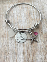 Load image into Gallery viewer, it matters to this one, stainless steel adjustable bangle bracelet, starfish charm, genuine sea glass and Swarovski birthstone, teacher gift