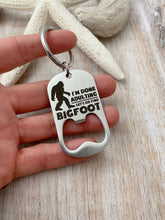 Load image into Gallery viewer, I'm done adulting let's go find Bigfoot - engraved stainless steel bottle opener keychain - gift for husband - beer bottle opener key ring