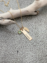 Load image into Gallery viewer, Gold tone necklace with birthstone crystal, bar with name and angel wing charm