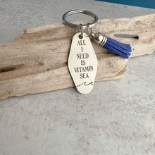 Load image into Gallery viewer, All I need is vitamin sea Motel fob keychain - engraved stainless steel - home - gift idea for beach lover - blue tassel