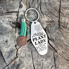 Load image into Gallery viewer, crazy plant lady - funny stainless steel motel fob keychain - faux leather tassel - gift for friend , monstera keychain