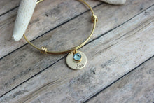 Load image into Gallery viewer, Gold plated stainless steel bracelet, Children's names Hand stamped NuGold discs, Swarovski crystal birthstones and wire bangle bracelet