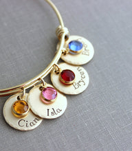 Load image into Gallery viewer, Gold plated stainless steel bracelet, Children's names Hand stamped NuGold discs, Swarovski crystal birthstones and wire bangle bracelet
