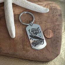 Load image into Gallery viewer, I need a good paddling , kayaking keychain
