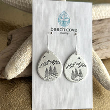 Load image into Gallery viewer, Teardrop Outdoor theme mountain earrings, silver tone with mountains, trees, moon and star
