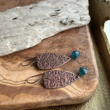 Load image into Gallery viewer, Copper textured dangle earrings with teal blue green Czech glass
