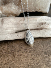 Load image into Gallery viewer, Whidbey Island Beach rock necklace with Whidbey Island cut out on back - black and white sterling silver
