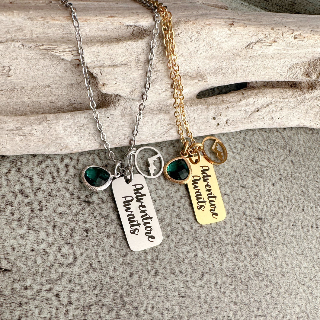 Adventure Awaits - Engraved stainless steel necklace - silver or gold with mountain charm and emerald green glass gem