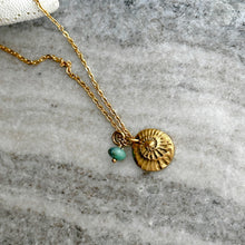 Load image into Gallery viewer, Gold shell fossil charm necklace - gold pewter with aqua Czech glass gem -Beach charm necklace - stainless steel
