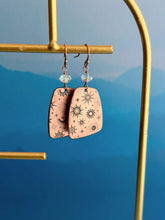 Load image into Gallery viewer, Rustic copper celestial dangle earrings with aurora borealis crystals - moons and stars
