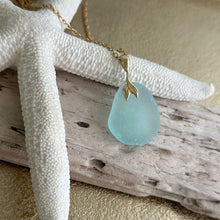 Load image into Gallery viewer, Aqua blue seafoam Sea glass pendant with gold brass mermaid tail bail and stainless steel chain
