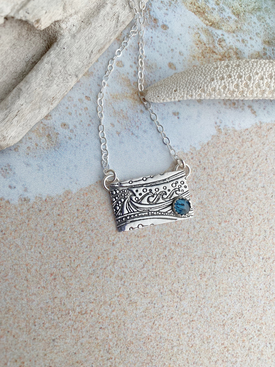 Sterling silver rectangle wave pendant with teal Kyanite stone