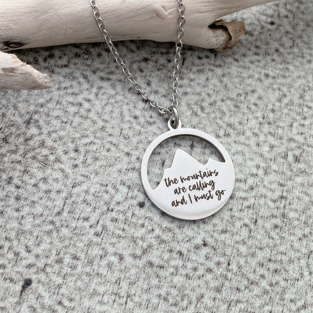 the mountains are calling and I must go - engraved stainless steel mountain range necklace