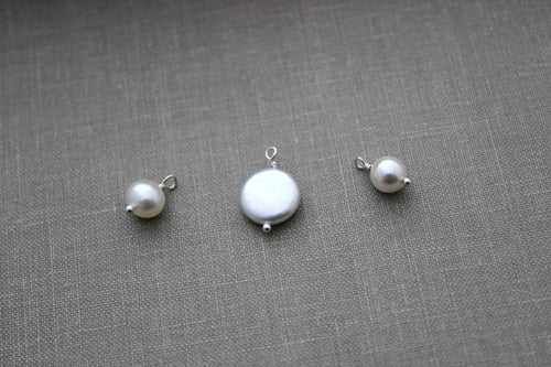 Add a small pearl  charm to a necklace or bracelet in my shop