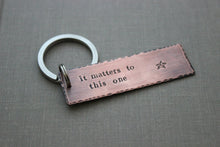 Load image into Gallery viewer, it matters to this one, the starfish story, Copper Hand Stamped Keychain, Long Rectangle,  Antiqued rustic style,  Teacher gift idea
