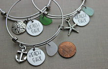 Load image into Gallery viewer, Beach Girl bracelet, stainless steel adjustable bangle, expandable wire bracelet, silver tone, Sand dollar, starfish or anchor, sea glass
