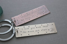 Load image into Gallery viewer, I love you more than the moon and stars Hand Stamped Keychain, Christmas Gift Idea,  Antiqued rustic style, Bronze gold tone celestial
