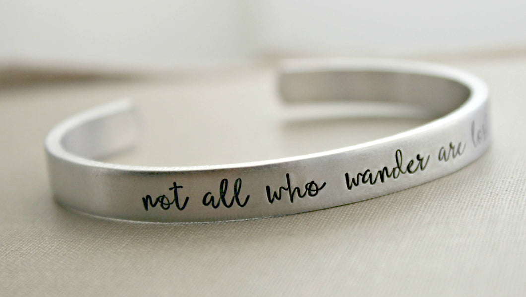 not all who wander are lost, Hand stamped aluminum bracelet, 1/4 Inch Bangle Silver tone Cuff Bracelet, Lightweight, Traveler - wanderer