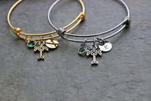 Load image into Gallery viewer, Silver or gold Celtic cross charm bracelet, stainless steel adjustable bangle, Swarovski crystal birthstone and personalized initial disc
