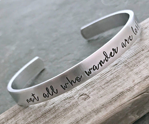 not all who wander are lost, Hand stamped aluminum bracelet, 1/4 Inch Bangle Silver tone Cuff Bracelet, Lightweight, Traveler - wanderer