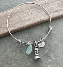 Load image into Gallery viewer, Lighthouse charm bracelet, stainless steel adjustable bangle with genuine sea glass, and hand stamped initial disc Beach glass jewelry
