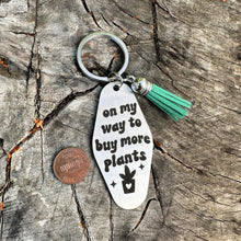 Load image into Gallery viewer, on my way to buy more plants - funny stainless steel motel fob keychain - faux leather tassel - gift for friend
