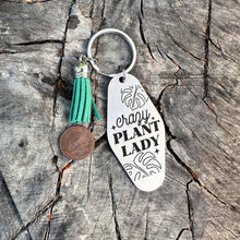 Load image into Gallery viewer, crazy plant lady - funny stainless steel motel fob keychain - faux leather tassel - gift for friend , monstera keychain

