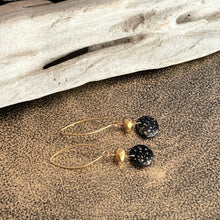 Load image into Gallery viewer, Black and gold Czech glass earrings - circle and faceted beads - dangle earrings - splatter design
