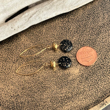 Load image into Gallery viewer, Black and gold Czech glass earrings - circle and faceted beads - dangle earrings - splatter design

