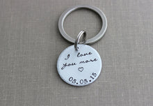 Load image into Gallery viewer, I love you more keychain with date, aluminum, copper or bronze Hand Stamped Keychain, circle disc silver tone,  Gift Idea for him Romantic
