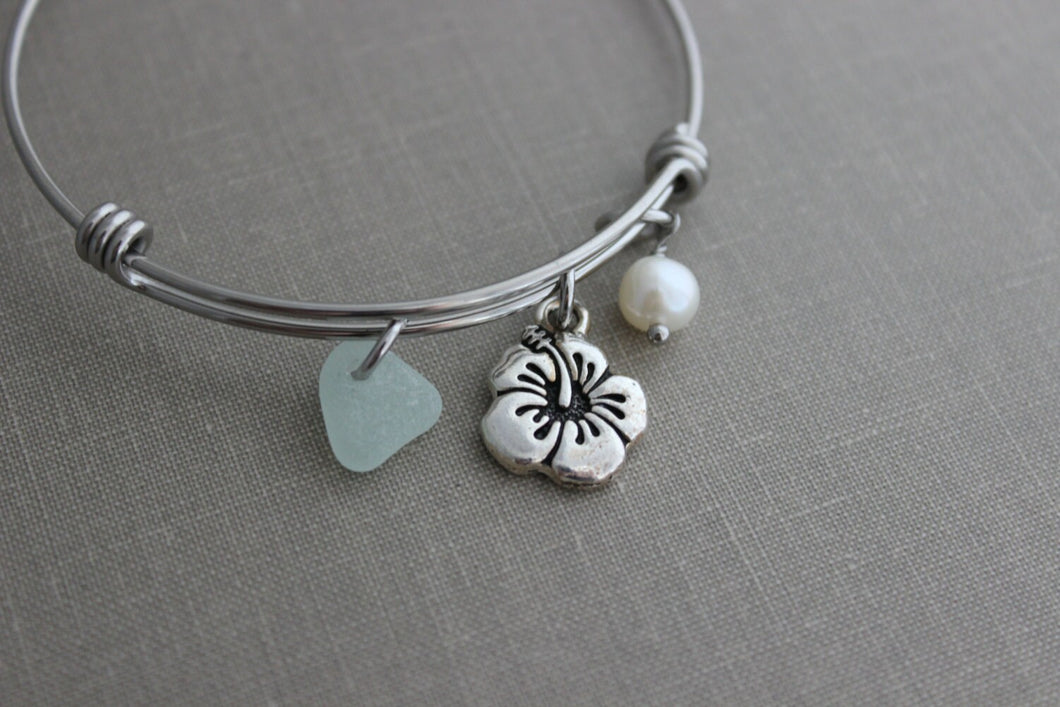 stainless steel adjustable beach bangle bracelet with pewter hibiscus flower charm, genuine sea glass and freshwater pearl Hawaiian jewelry